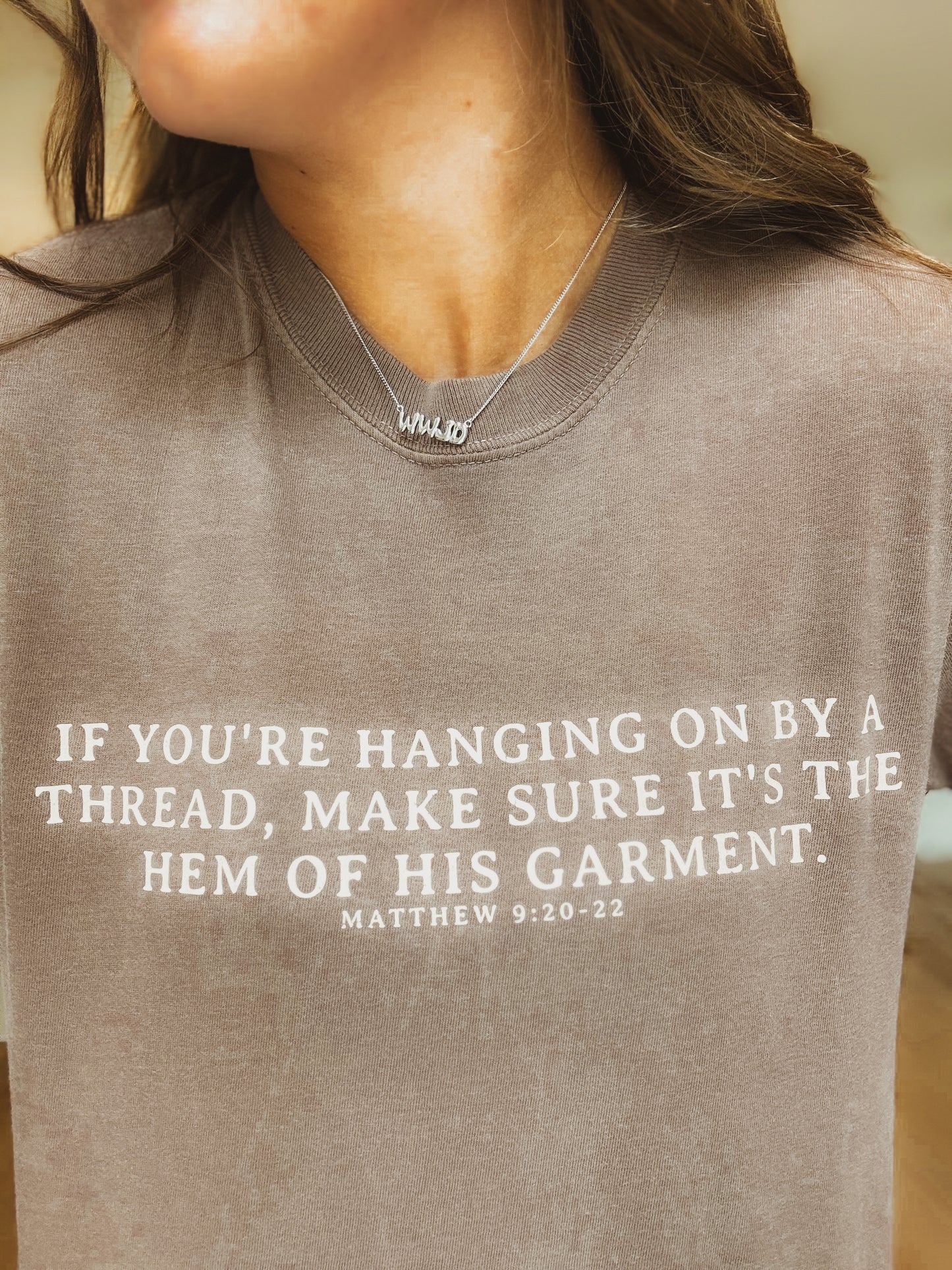 "Hanging on By The Hem of His Garment" Tee