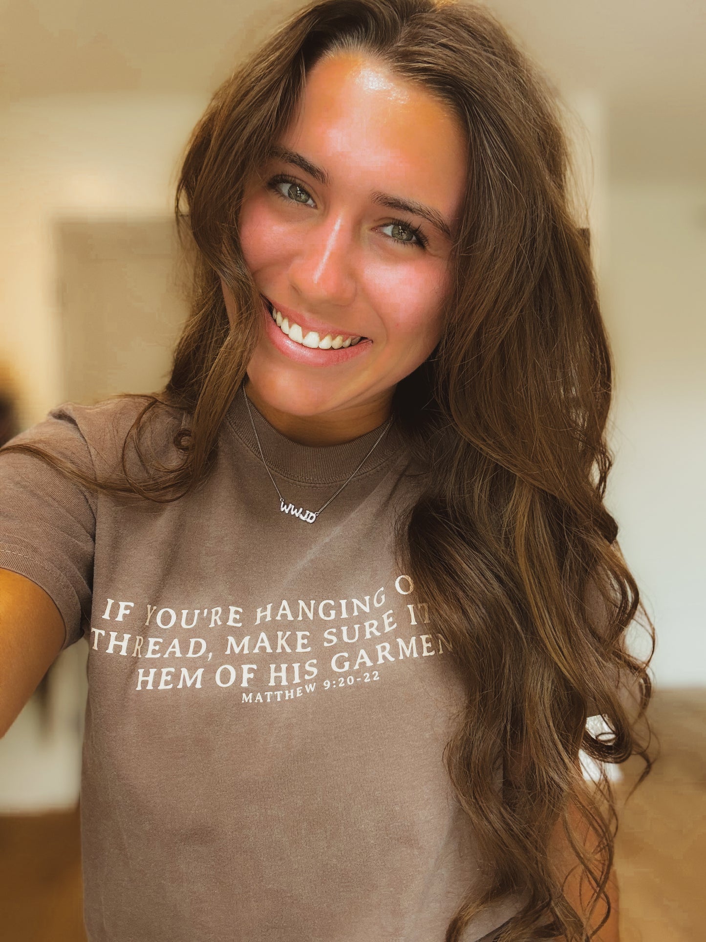 "Hanging on By The Hem of His Garment" Tee